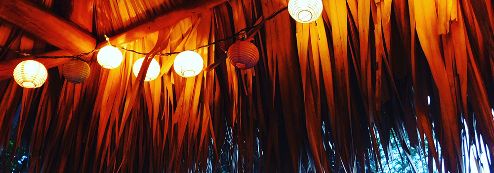 Tiki Tent with paper lantern lights.