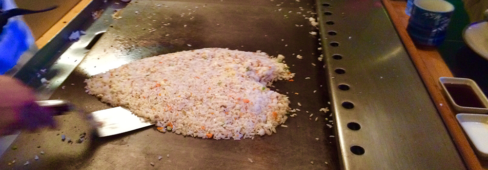 Fried rice in the shape of a heart on hibachi grill
