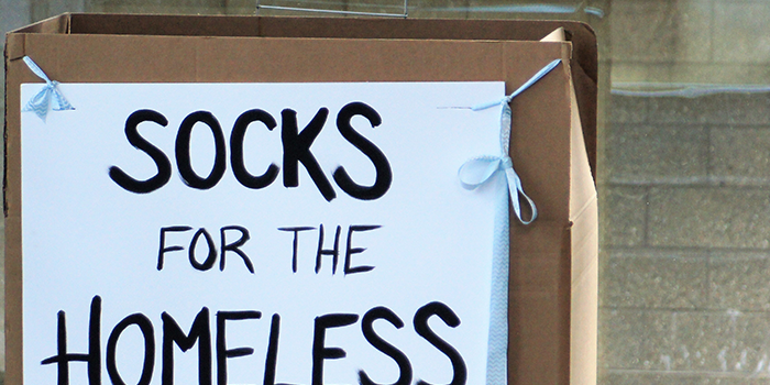Sign that says socks for the homeless